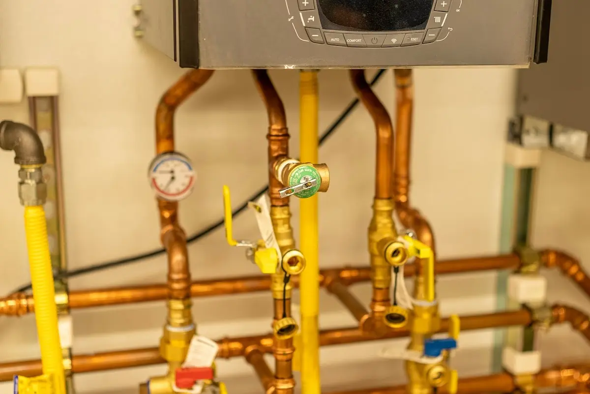 Licensed technician providing Water Heater Installation for a homeowner in Derby